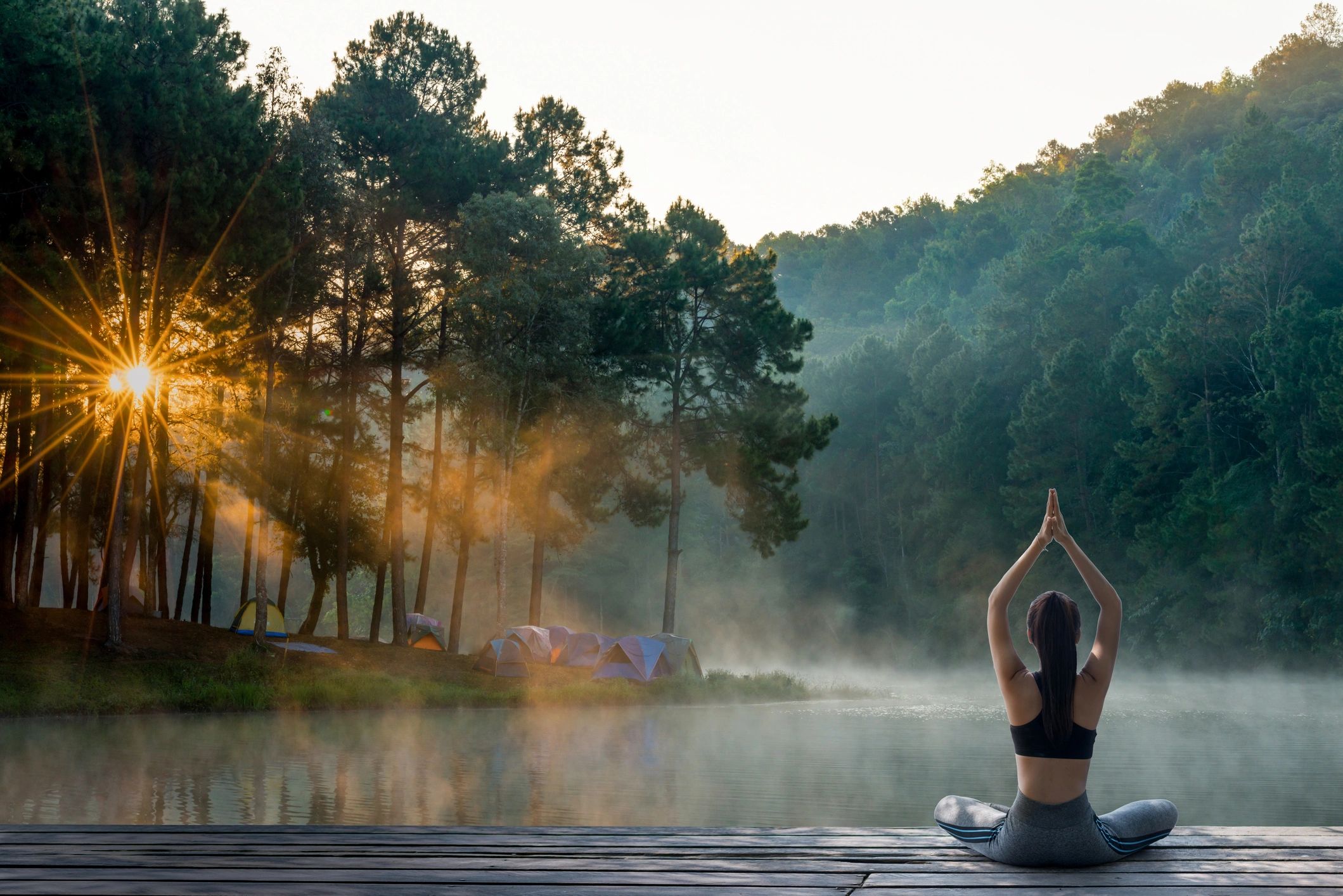 Person meditating in a serene environment